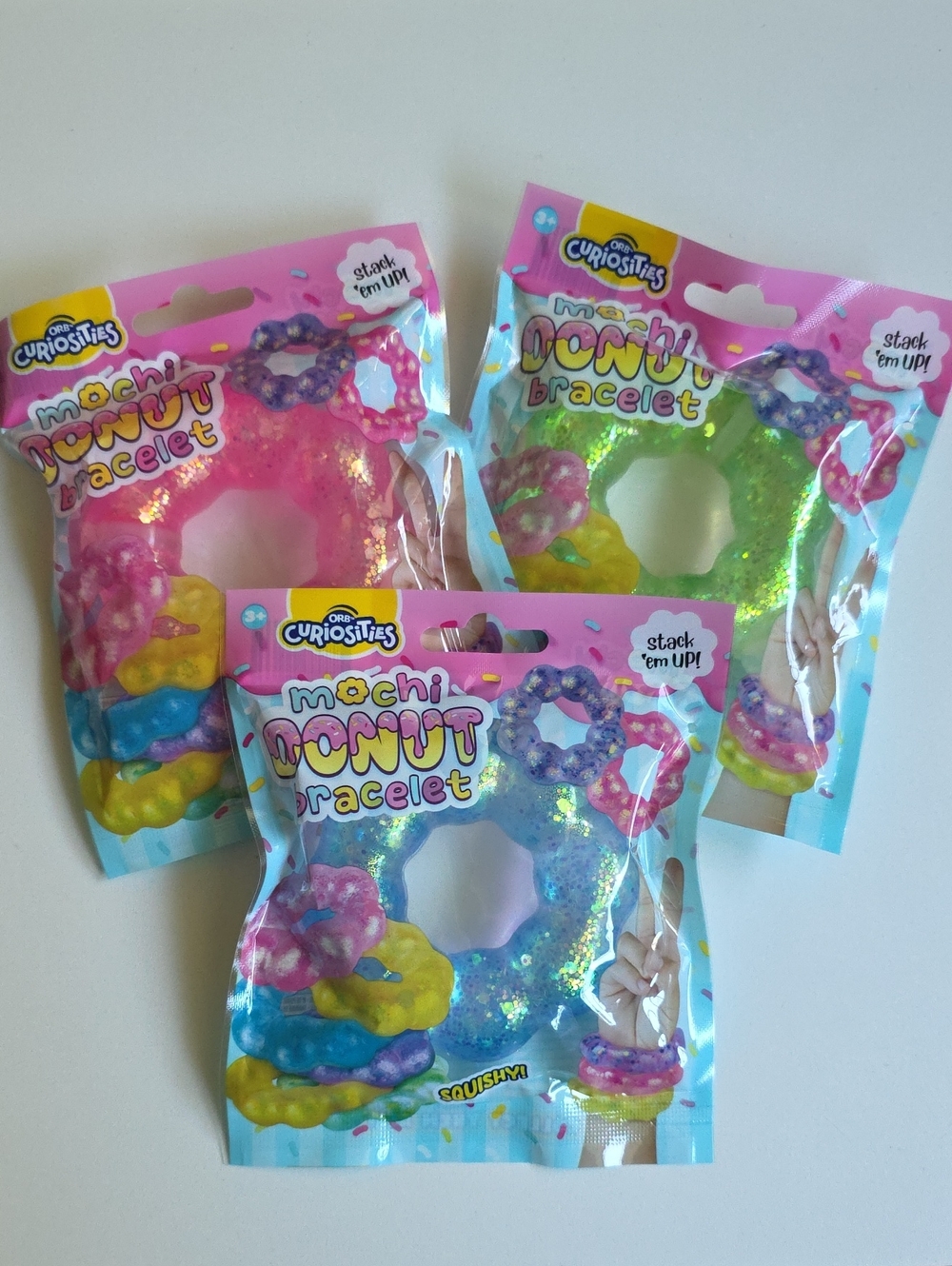 ORB Curiousities Squishy - Mochi Donut Bracelet Set Of 3 Glitter Stackable - NWT
